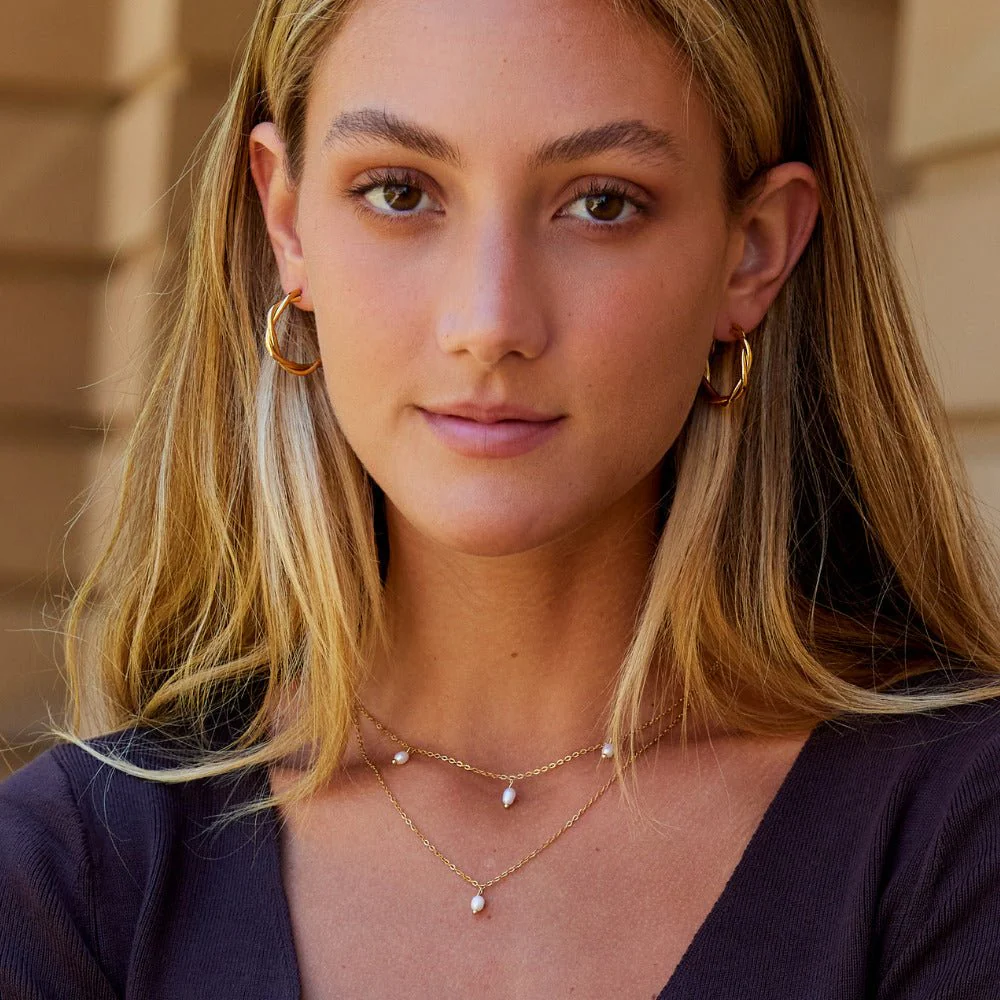 Twisted Celine Hoop Earrings - Image 4
